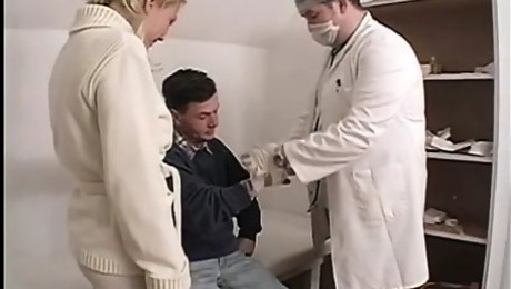 Men dressed as doctors put huge dildo on male patient