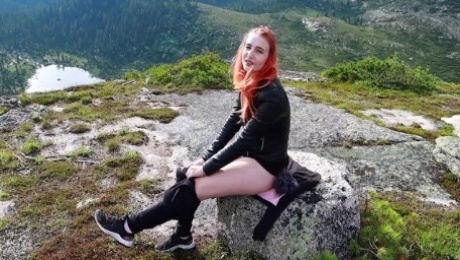 Girl decided to relax, masturbate her pussy and get an orgasm high in the mountains!